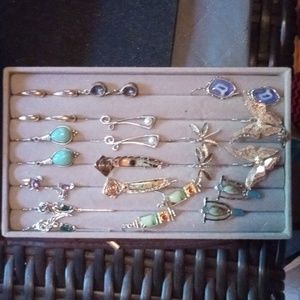 13 Pair Beautiful, Never Worn Earrings.  Comes with display box.